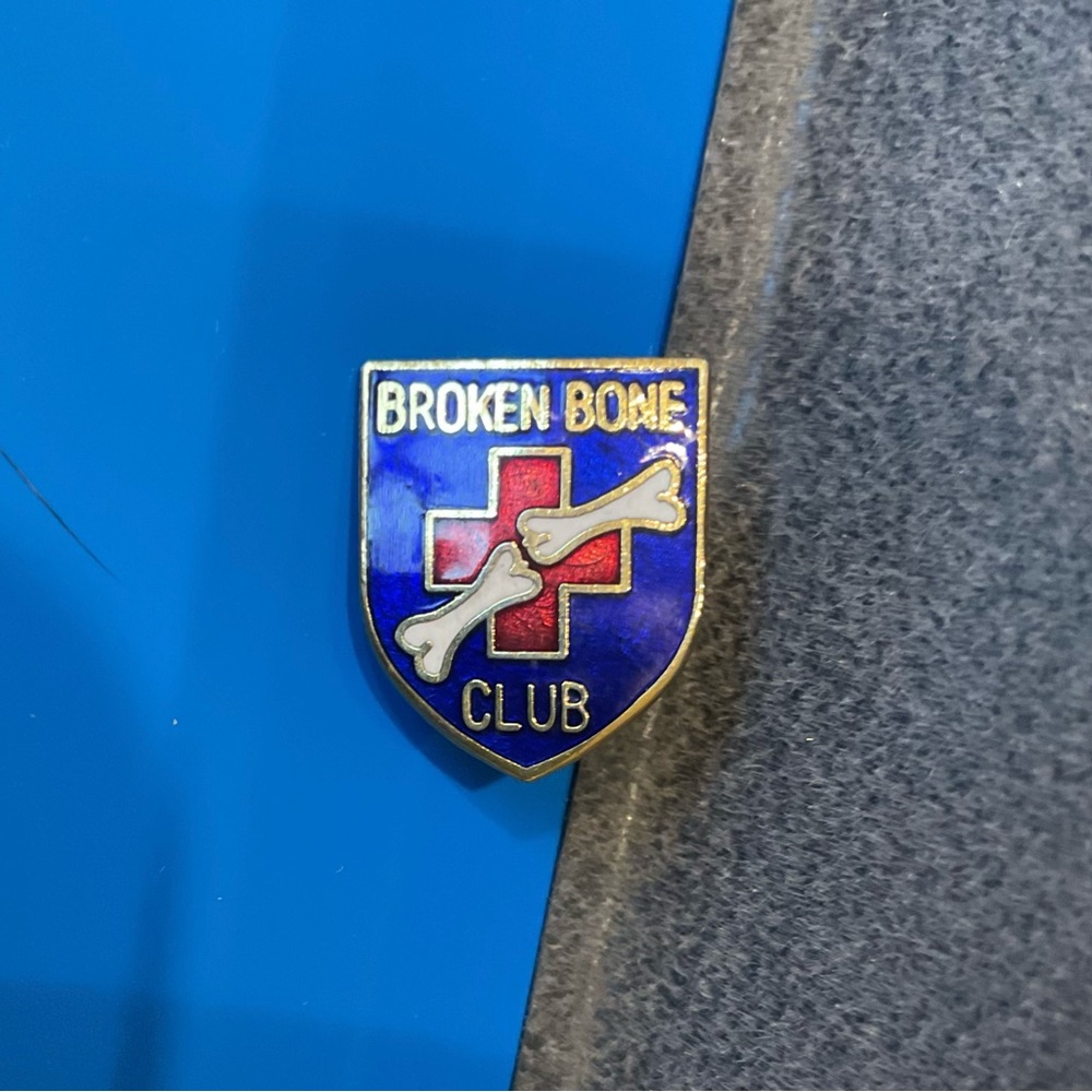 Broken bones club pin